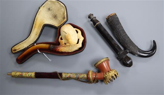 A carved Meerschaum pipe and two other pipes Meerschaum pipe 14cm long